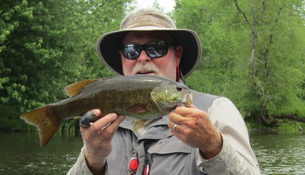 Jeff holding smallmouth from St. Croix river