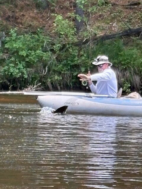 Jeff landing a big smallmouth bass - 2